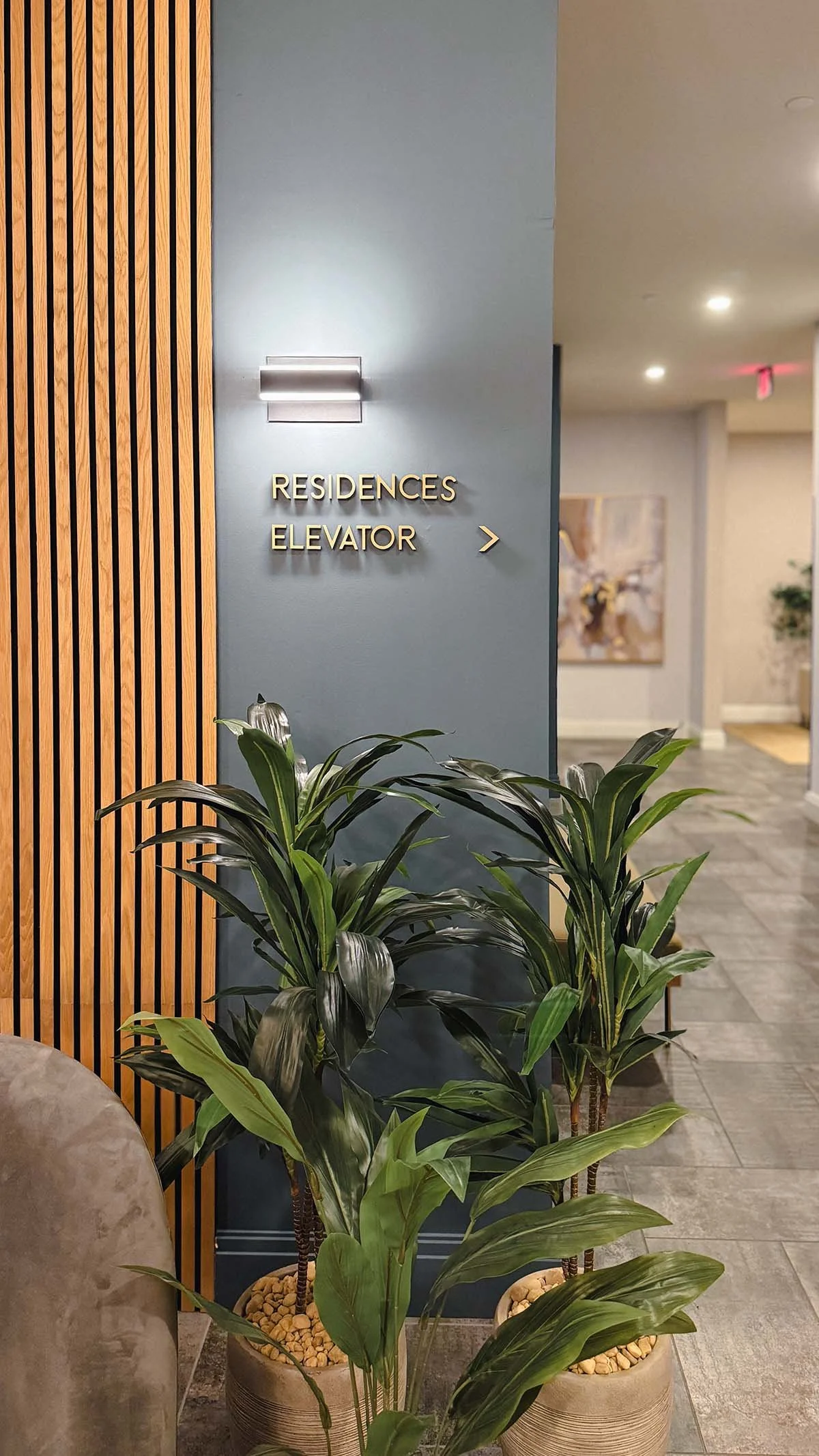 slat wall+blue walls+signage+plants+lobby.jpg