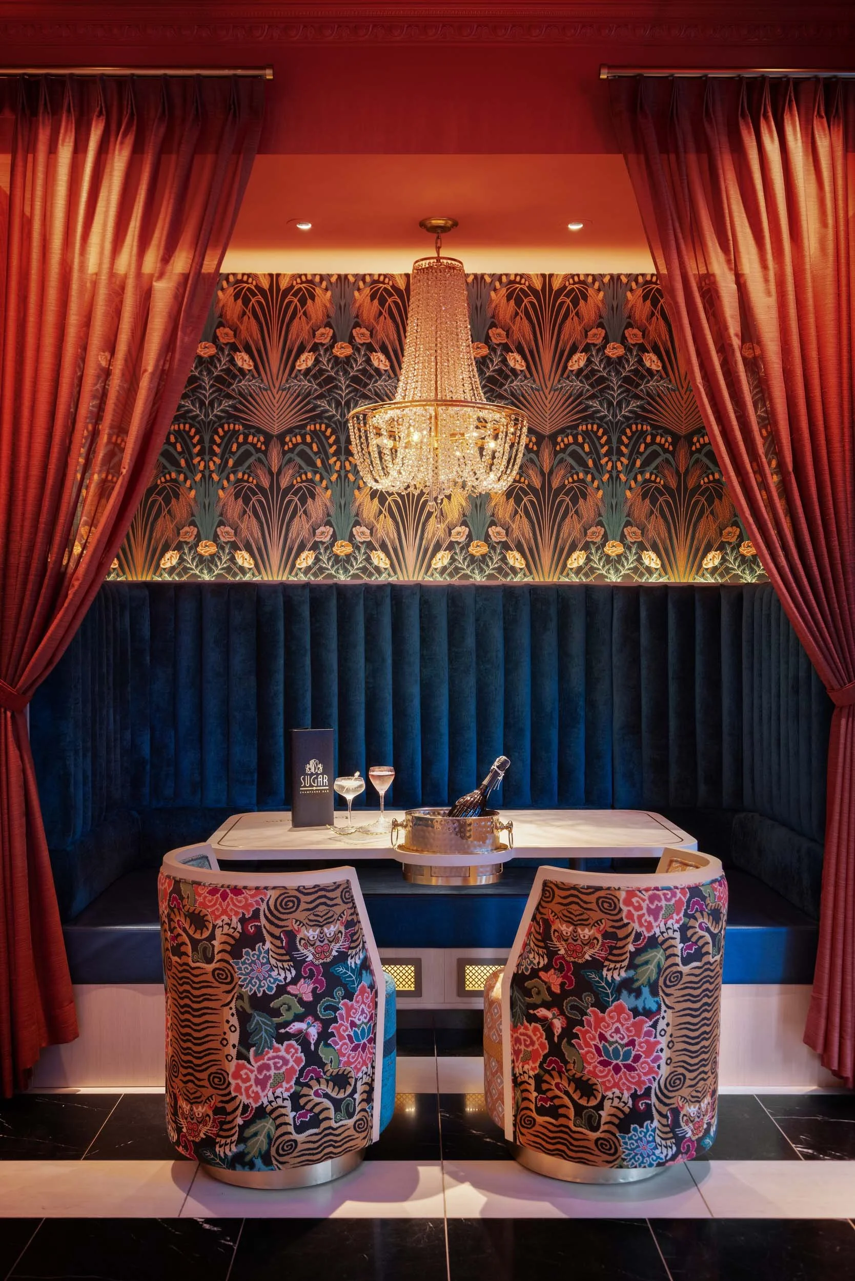 sugar+chandelier+stools+booth seating.jpg