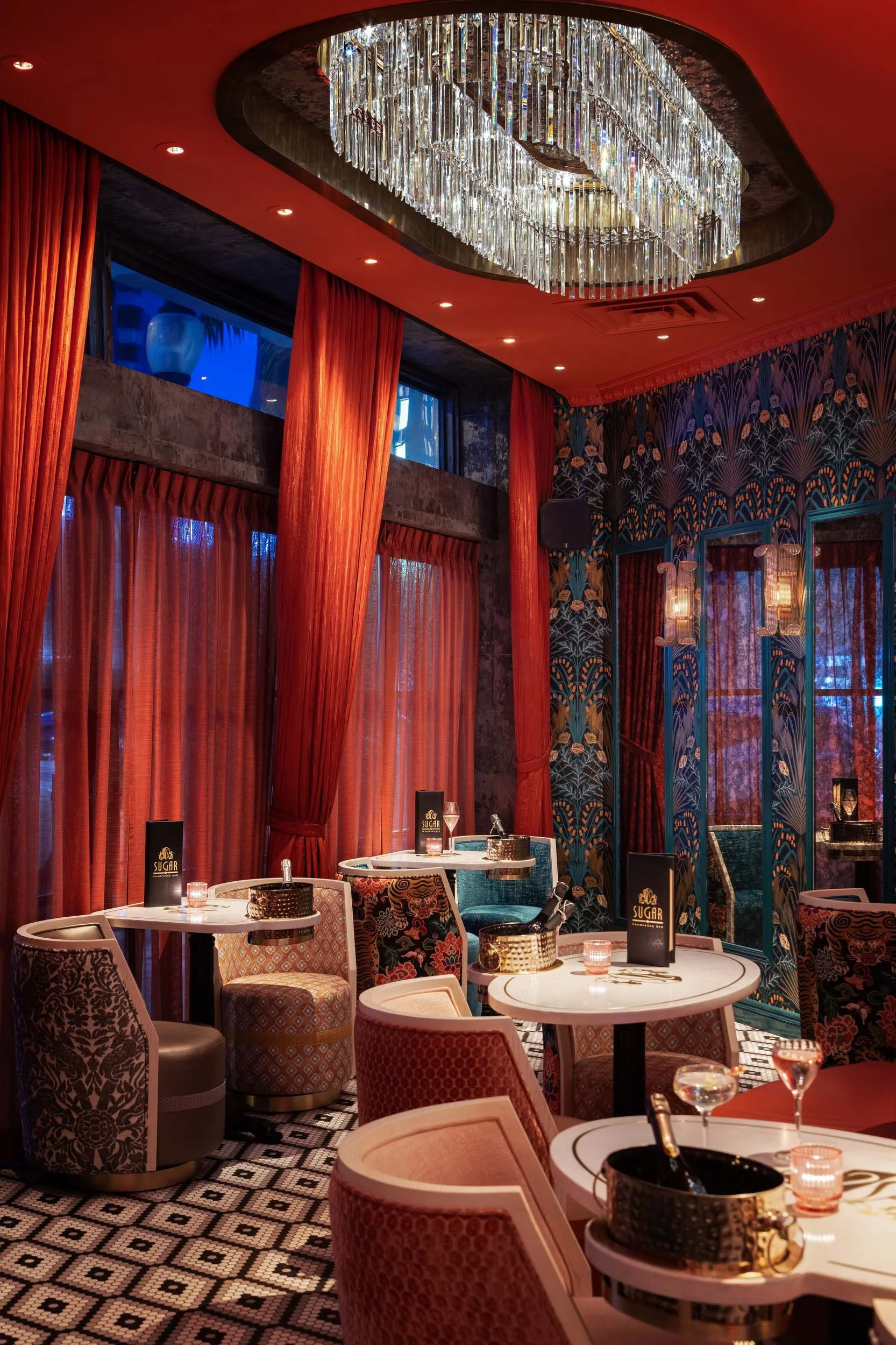 champagne+chandelier+pink+bar+coral+high end bar.jpg