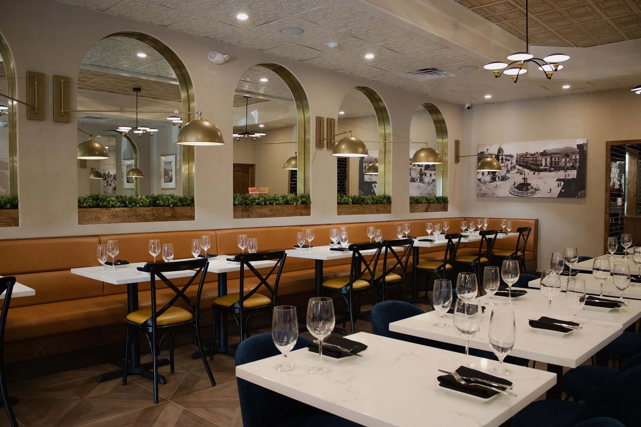 restaurant+tables+arches+mirrors+wall arm sconce.jpg