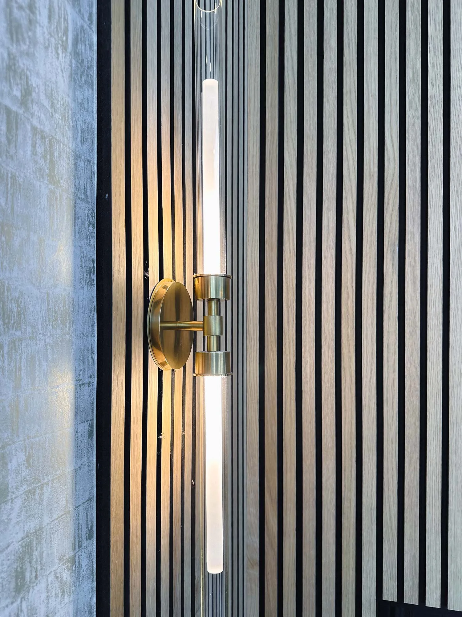 slat wall+modern wall sconce+gold sconce.jpg