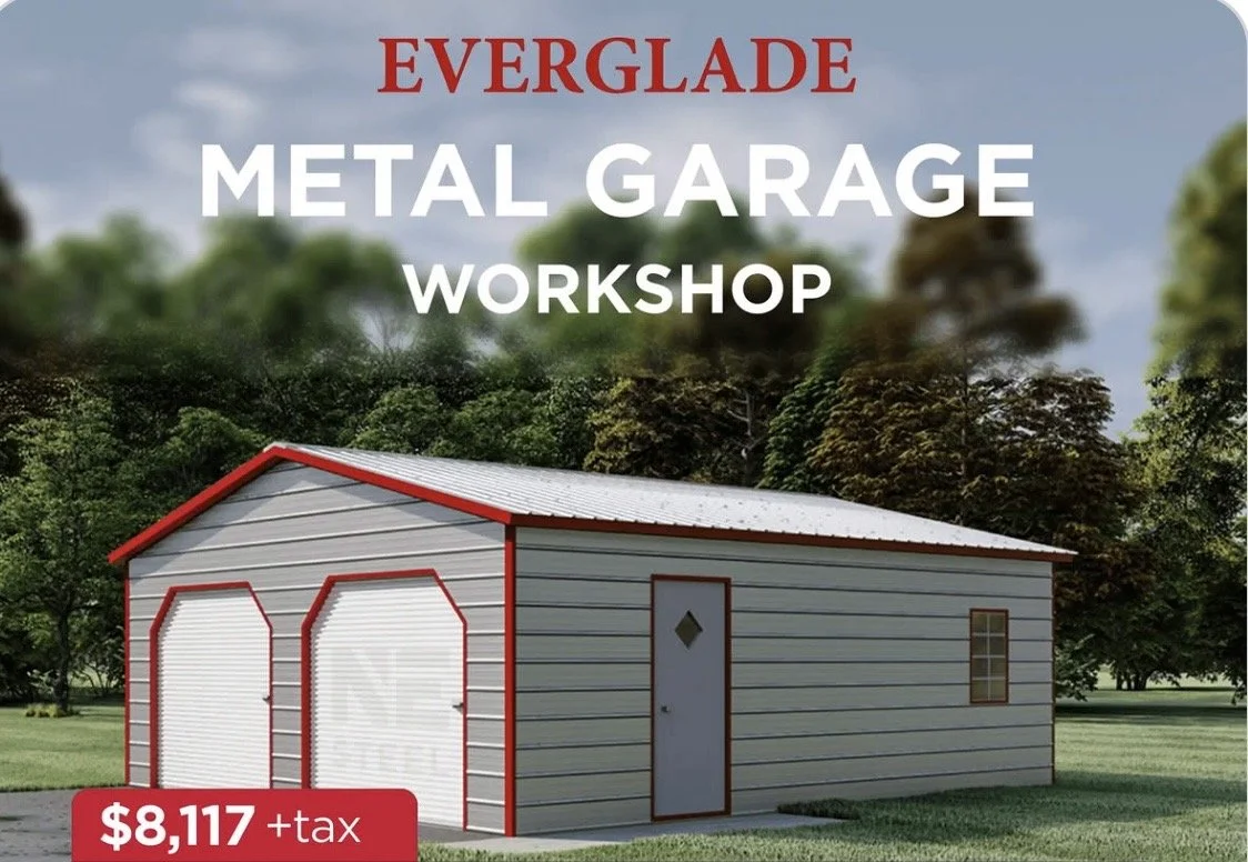 A metal garage workshop building with two roll-up doors, a side door with a diamond-shaped window, and a window on the side, set outdoors with trees in the background. The image includes text advertising the Evergreen Metal Garage Workshop for $8,117 plus tax.