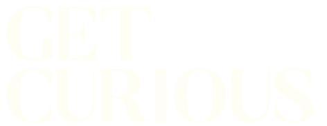 Text image with the words 'GET CURIOUS' in white capital letters on a black background