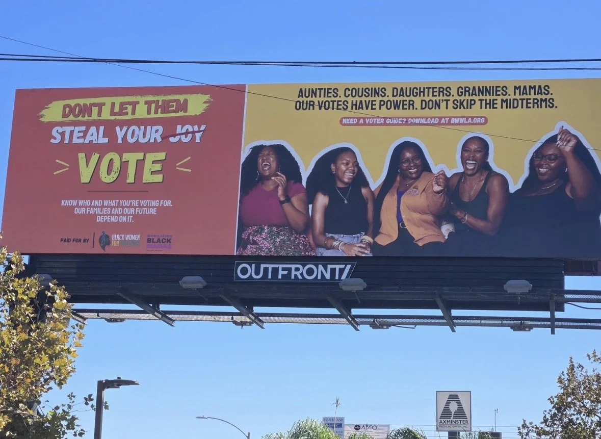 Image of a billboard featuring Black Women joy