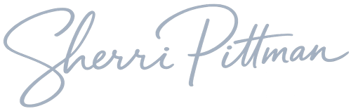 Signature-style text of the name 'Sherri Pittman' in light purple.