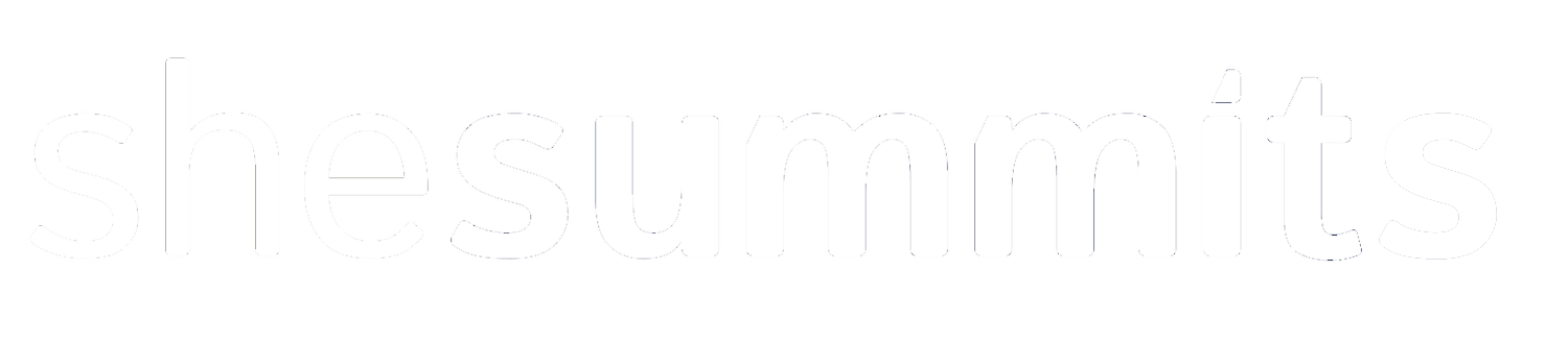 Logo for 'she summits' with stylized text and a mountain peak graphic