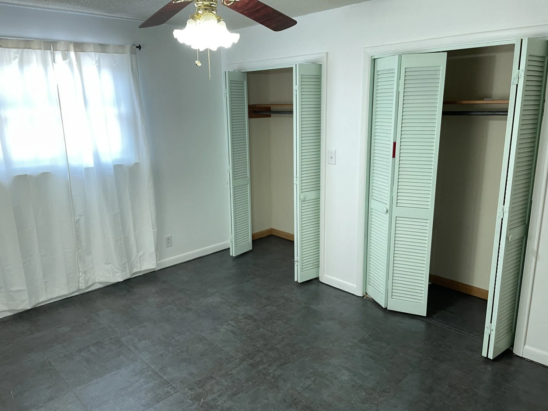 Before photo of an old bedroom floor prior to a new installation by All Phase Flooring LLC in Clarksville, TN.