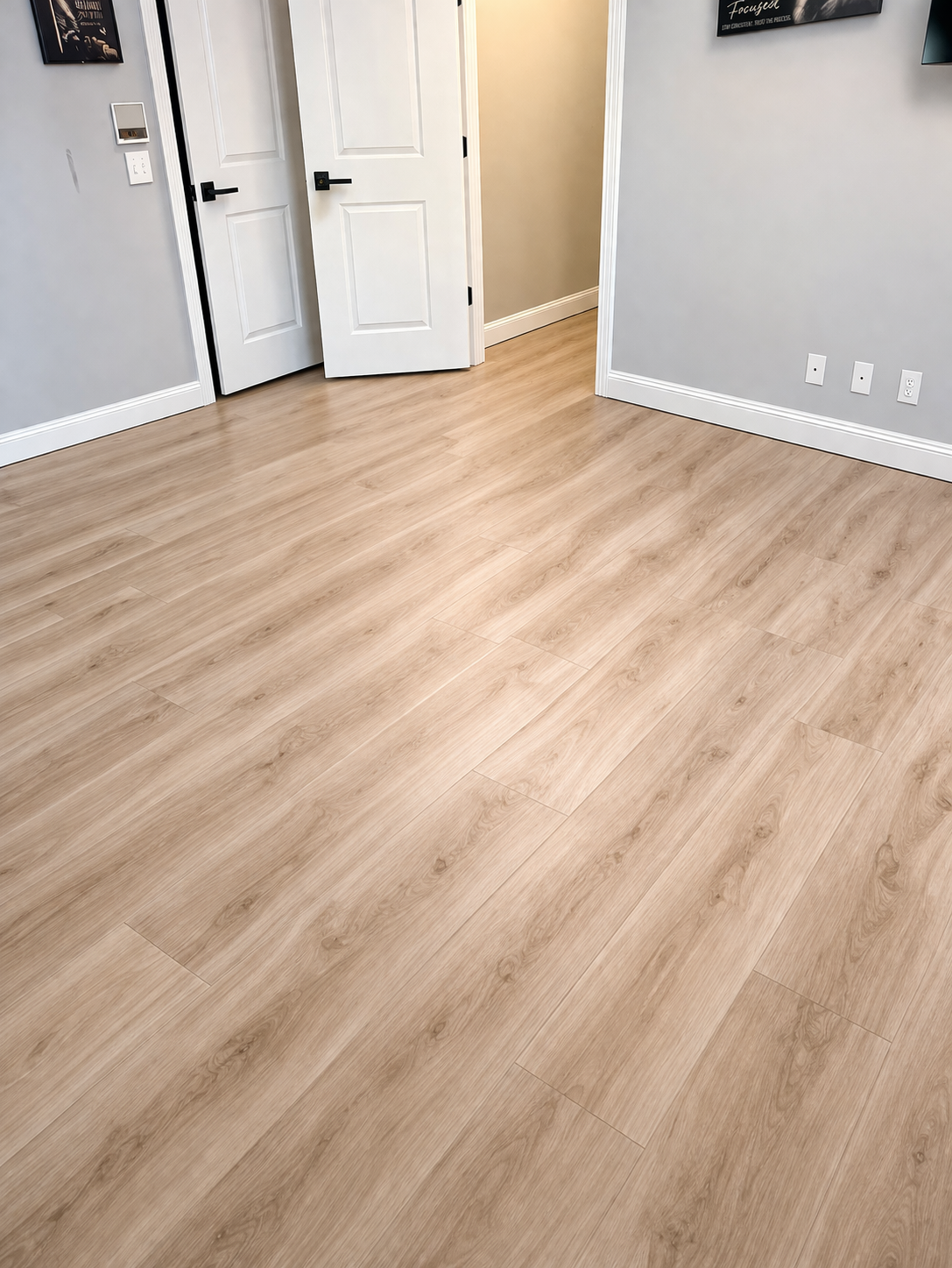 Completed luxury vinyl plank flooring installation in a home by All Phase Flooring LLC in Clarksville, TN.