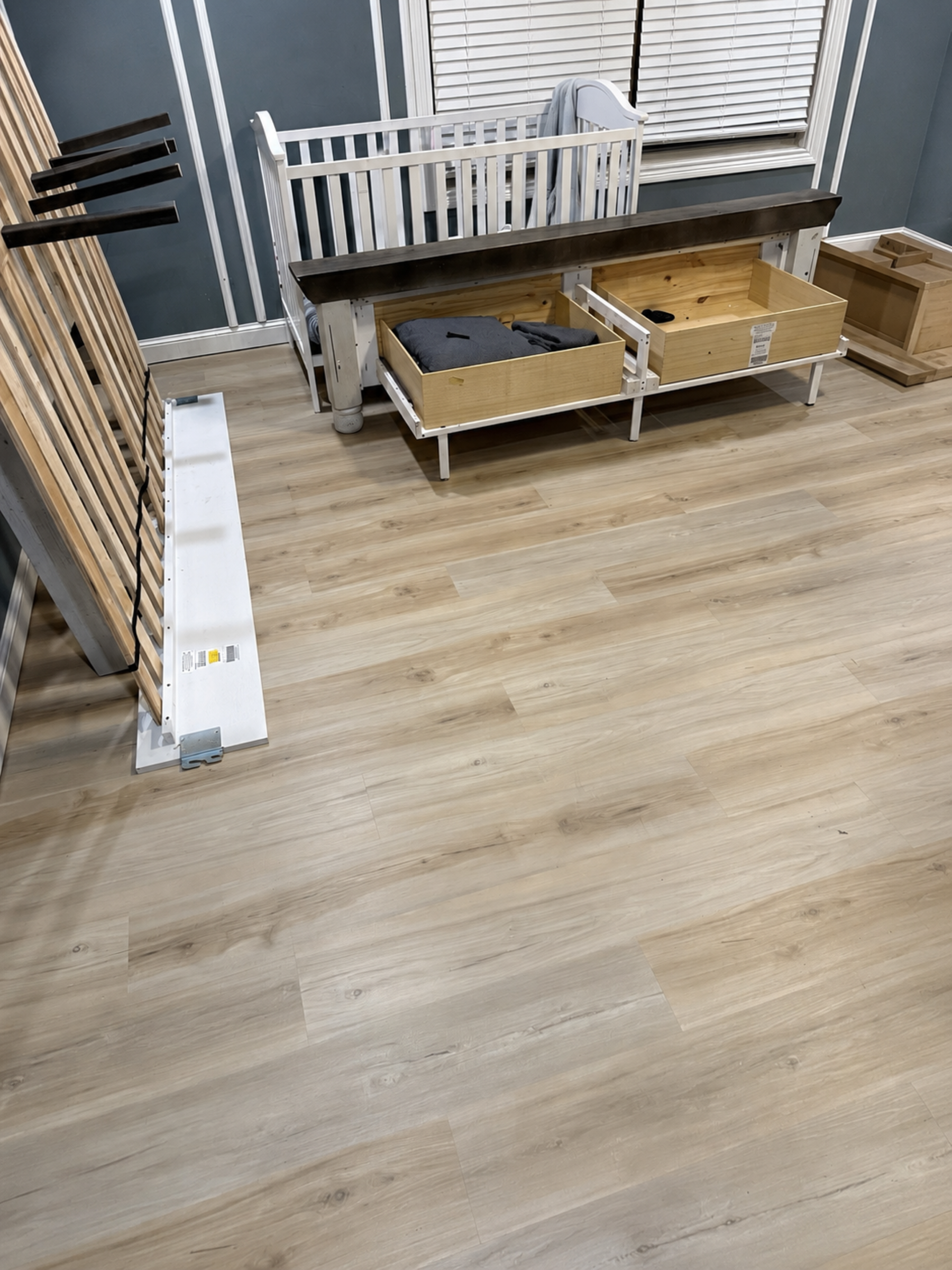 After photo showing a beautiful new hard-surface floor installation in the same Springfield master bedroom by All Phase Flooring LLC.
