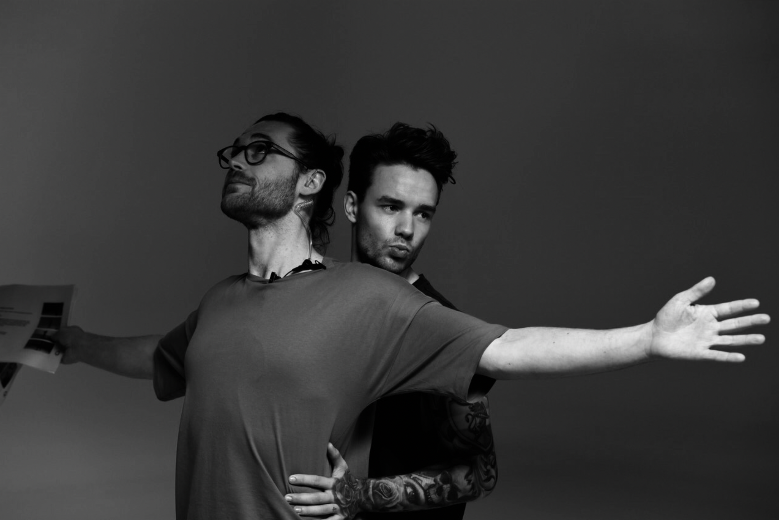 Creative director Ben Newbury posing with Liam Payne at an event for a product launch.