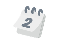A small desk calendar showing the number 2 on a white page.