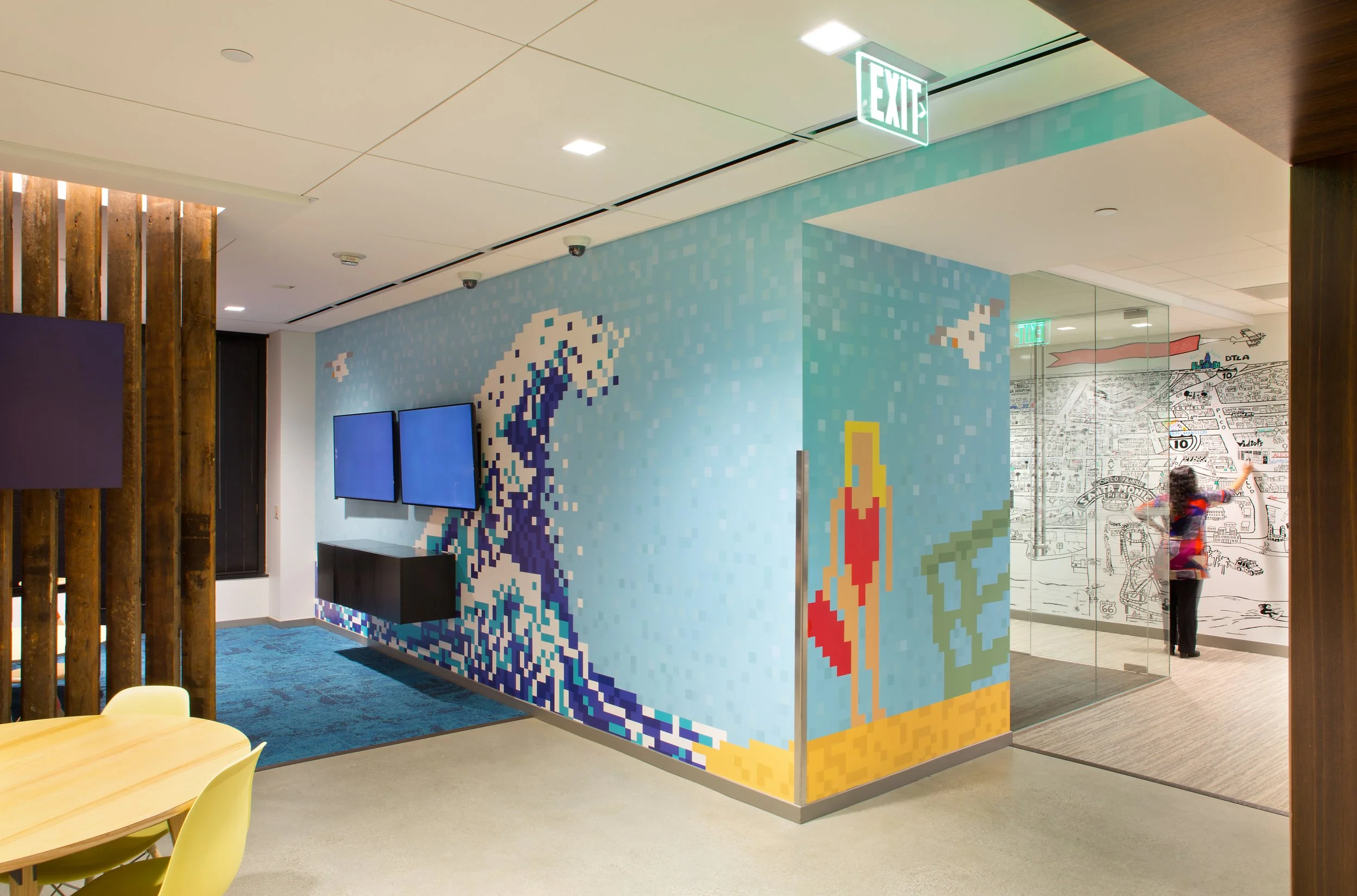 Indoor space with pixel art mural 
