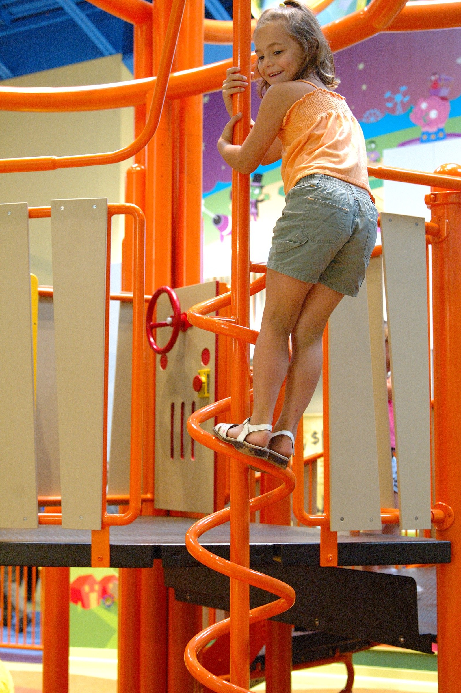 Children playing at PBS Kids Backyard play zone