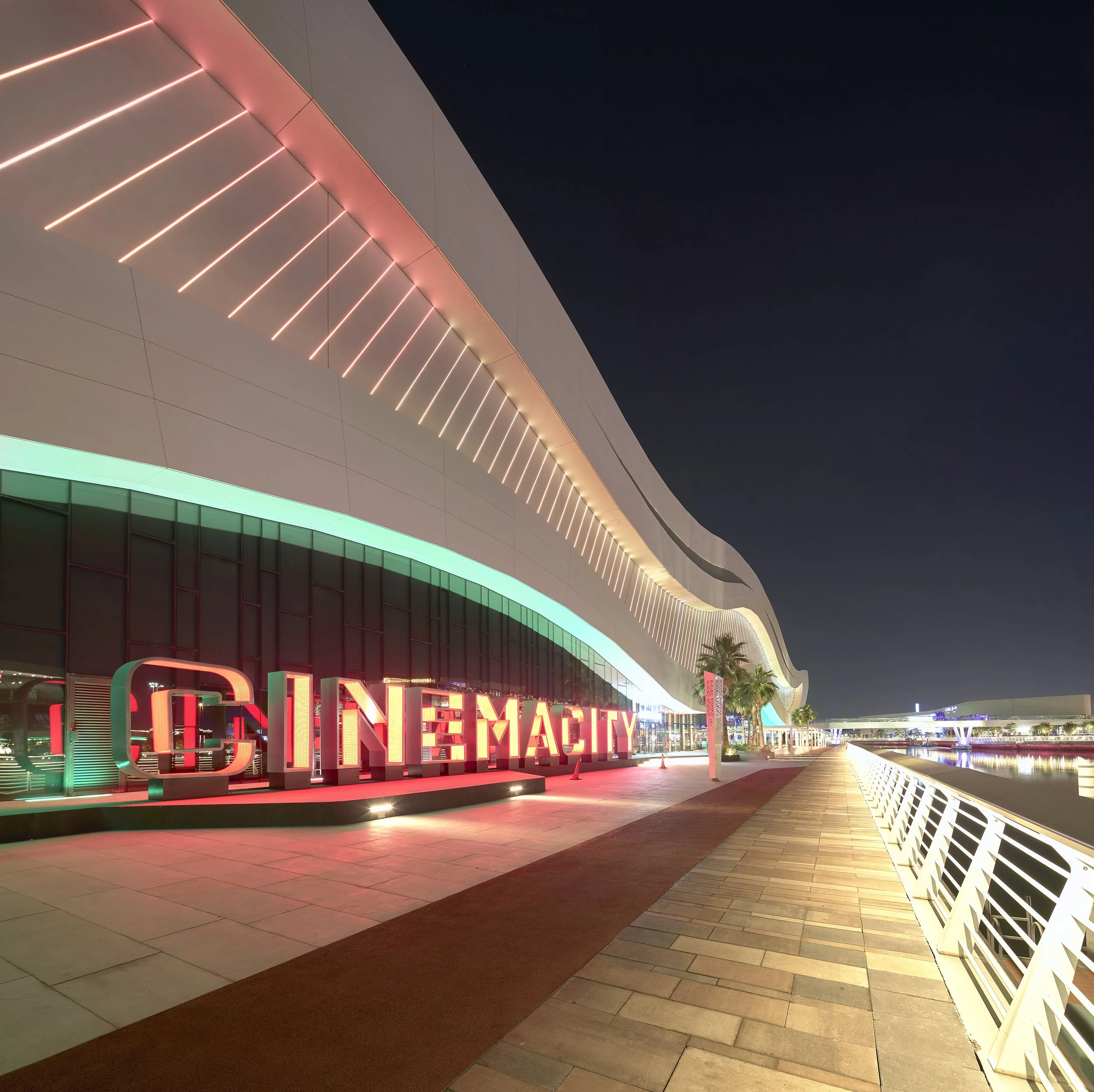 Nighttime view of Cinemacity Al Qana