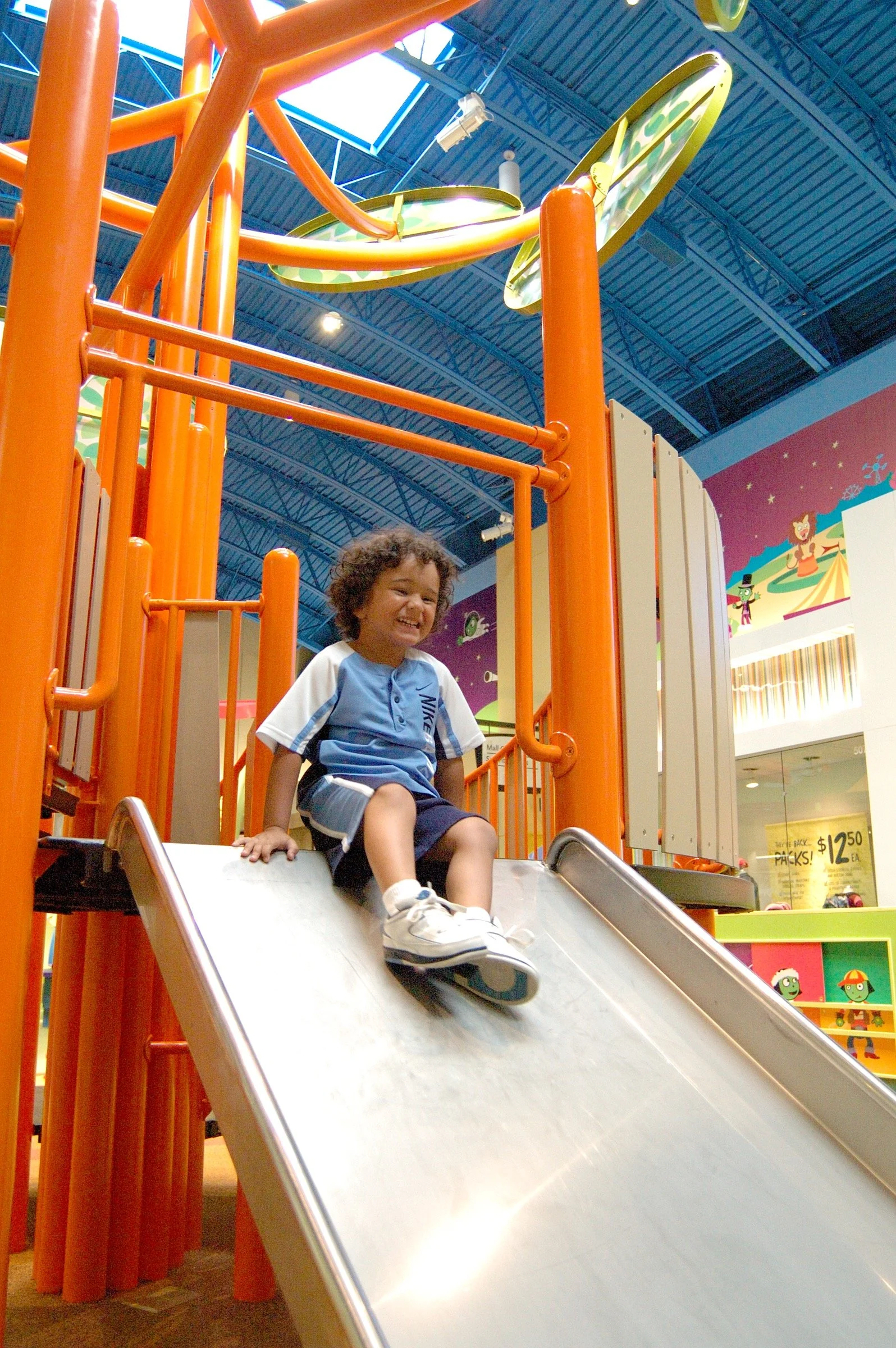 Children playing at PBS Kids Backyard play zone