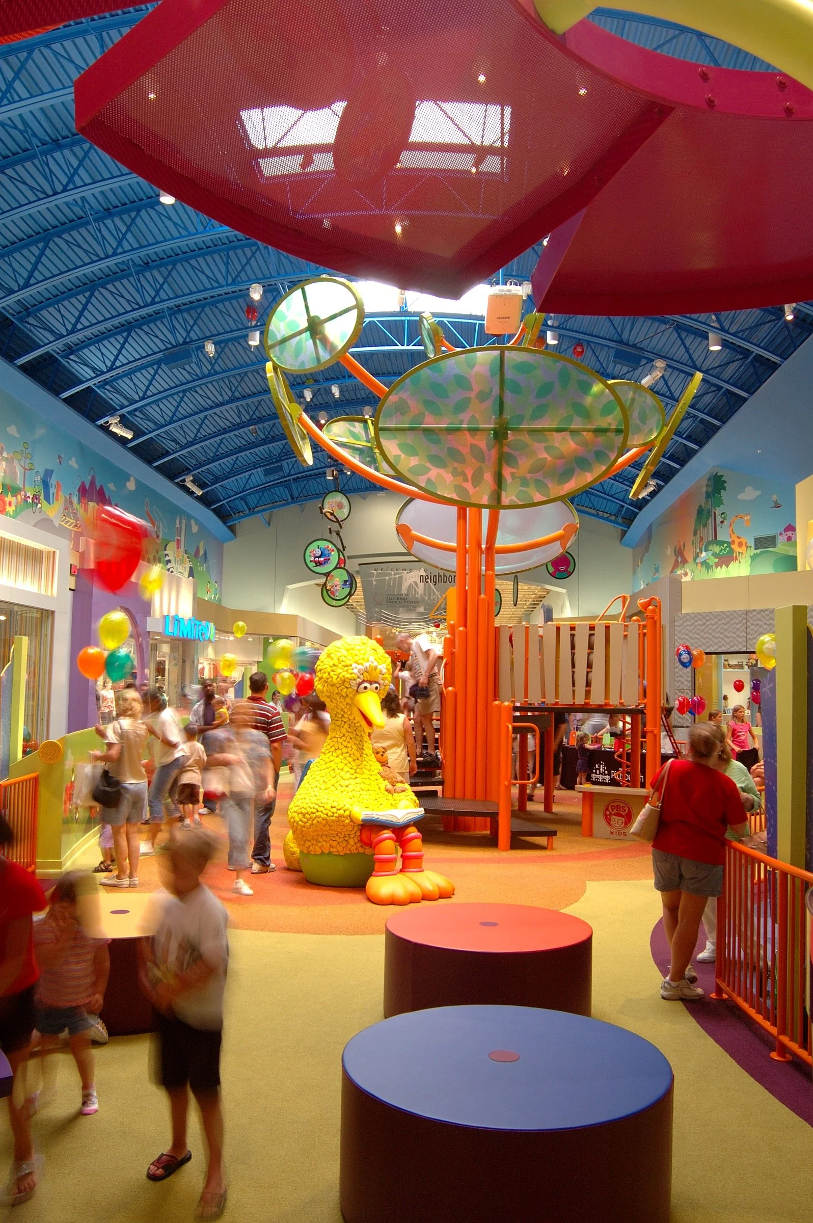 Children playing at PBS Kids Backyard play zone
