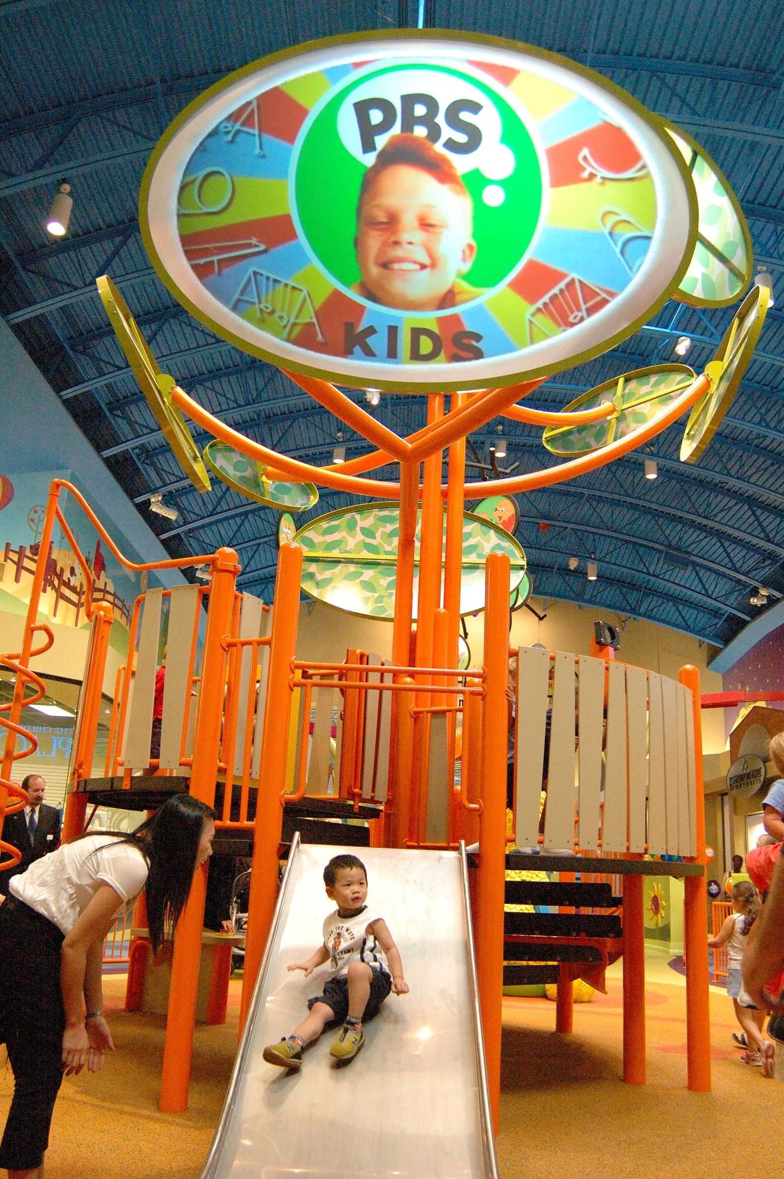 Children playing at PBS Kids Backyard play zone