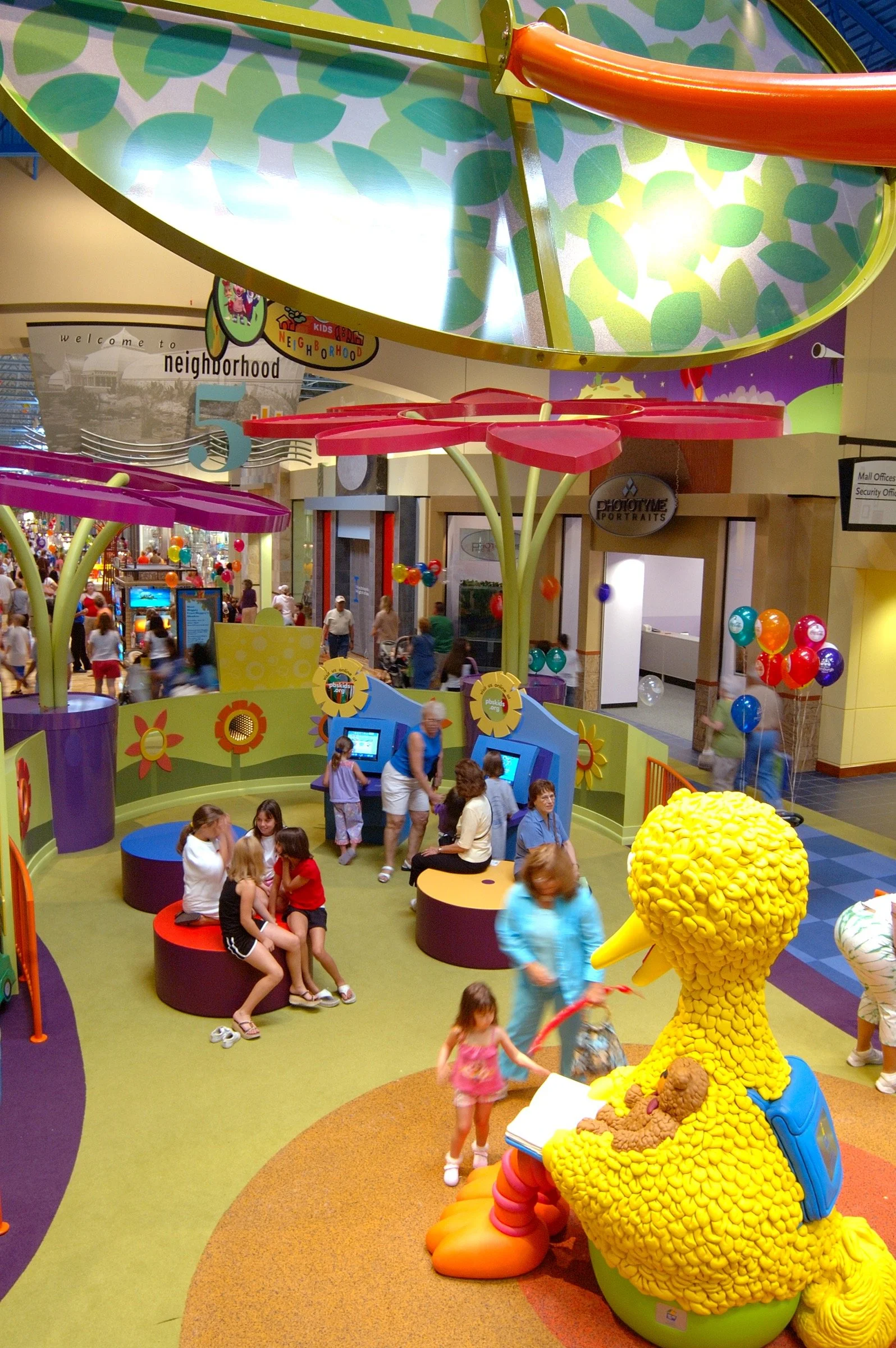 Children playing at PBS Kids Backyard play zone