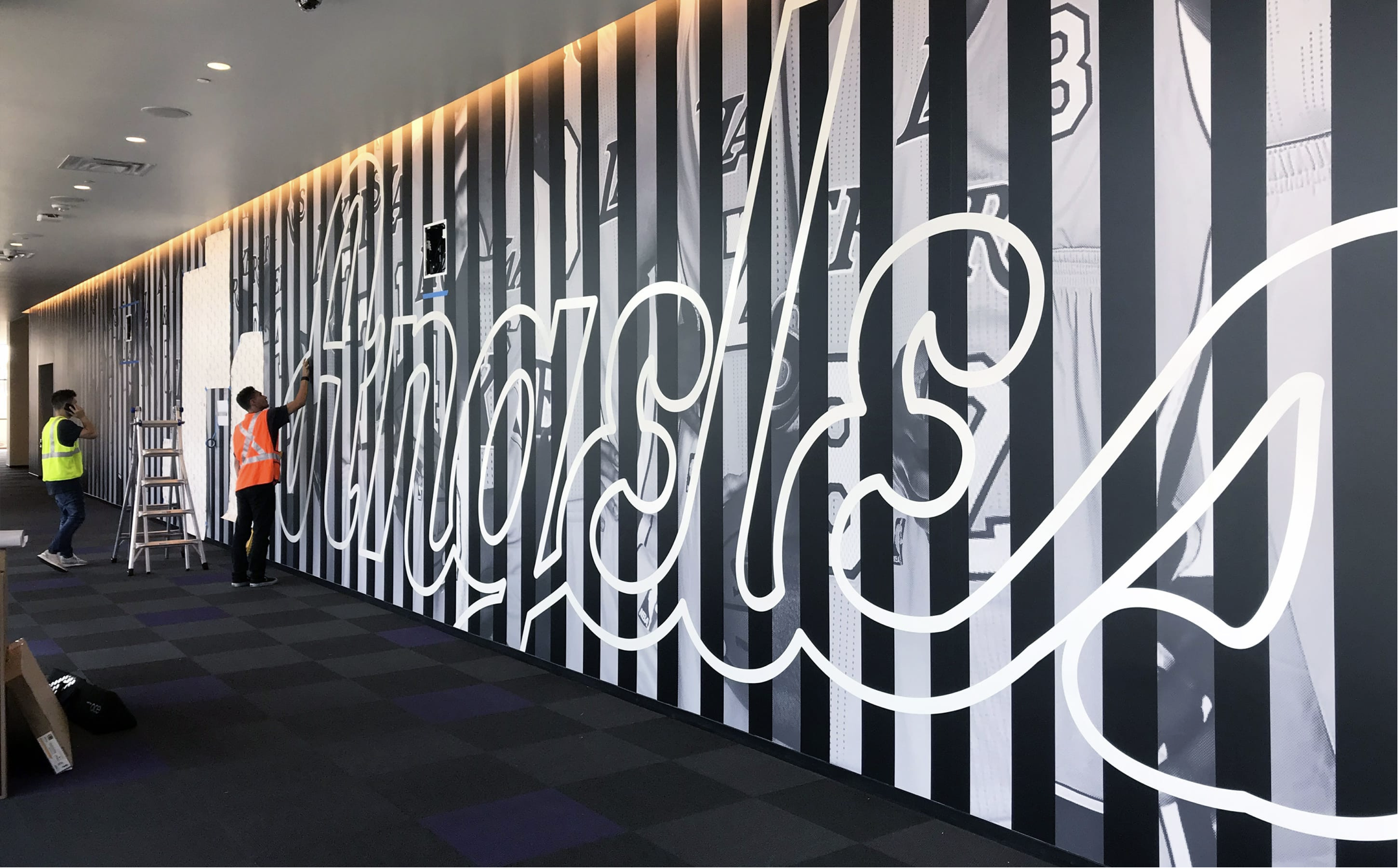 Installation of large mural at The UCLA Health Training Center 