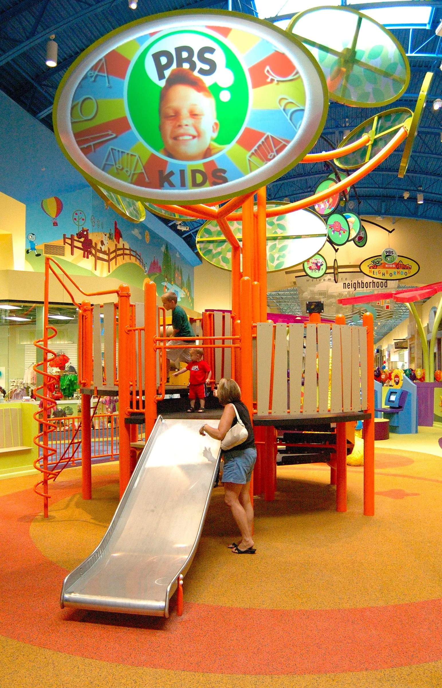 Children playing at PBS Kids Backyard play zone