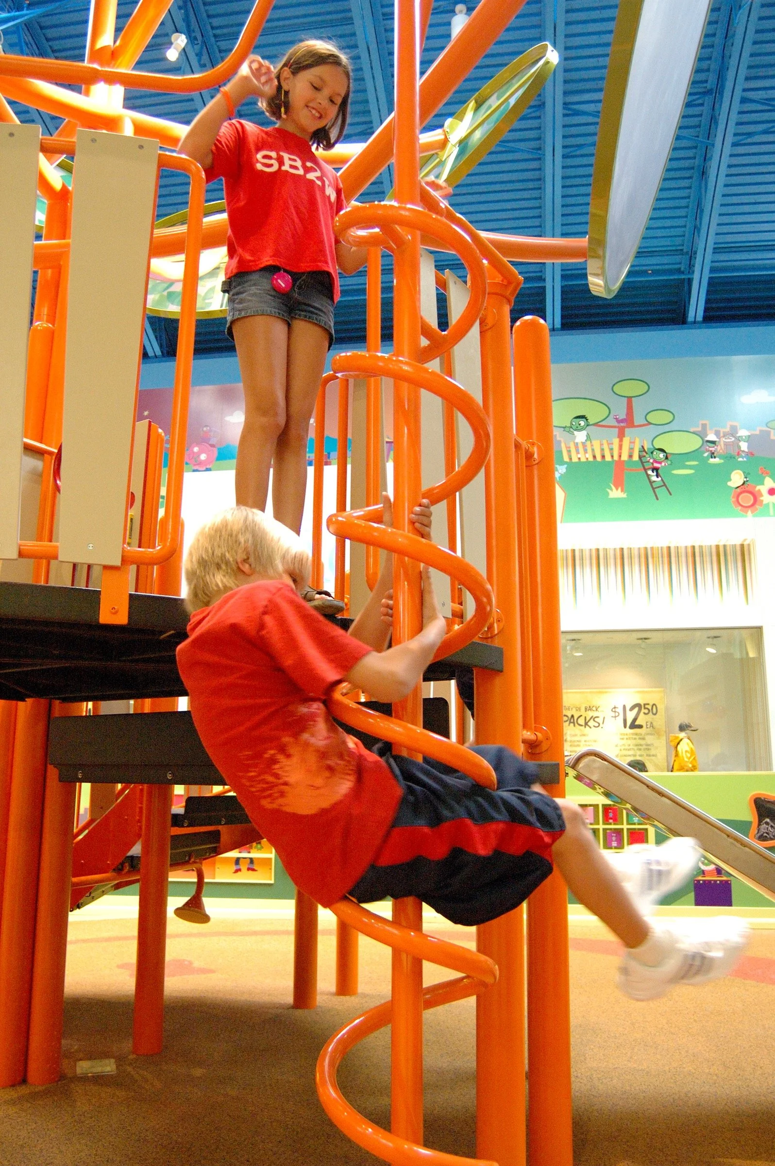 Children playing at PBS Kids Backyard play zone