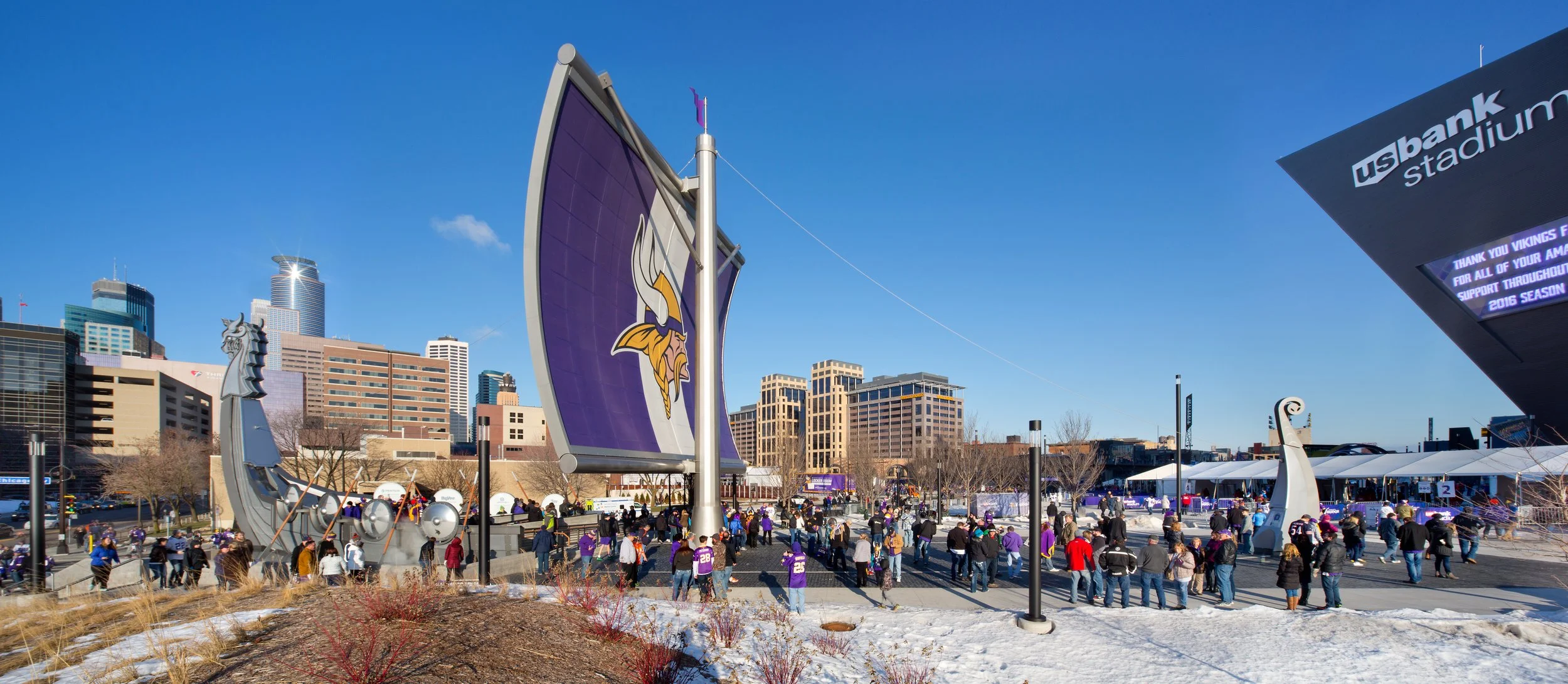 Wide shots of community engagement with the Viking Legacy Ship.