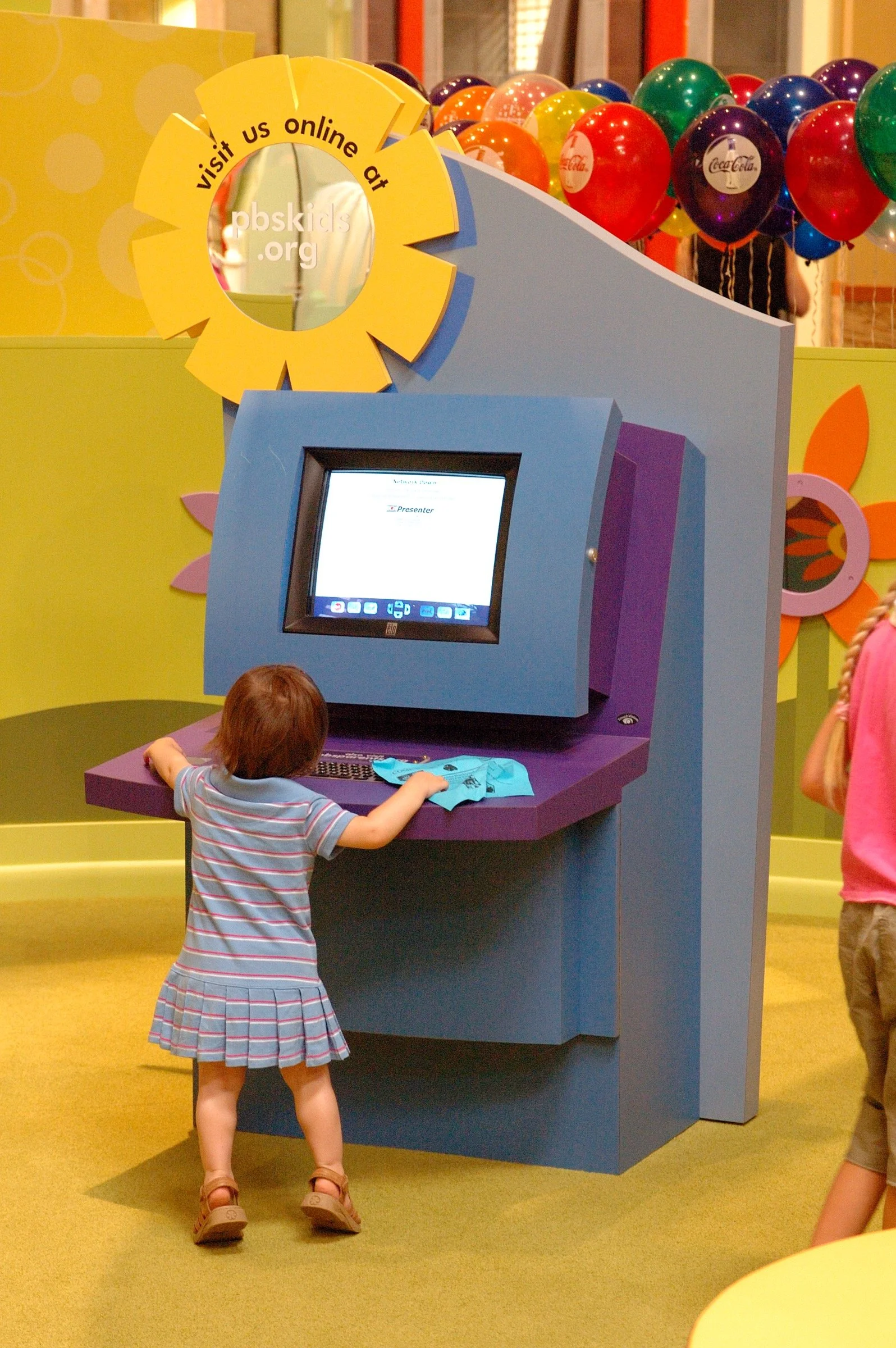 Children playing at PBS Kids Backyard play zone