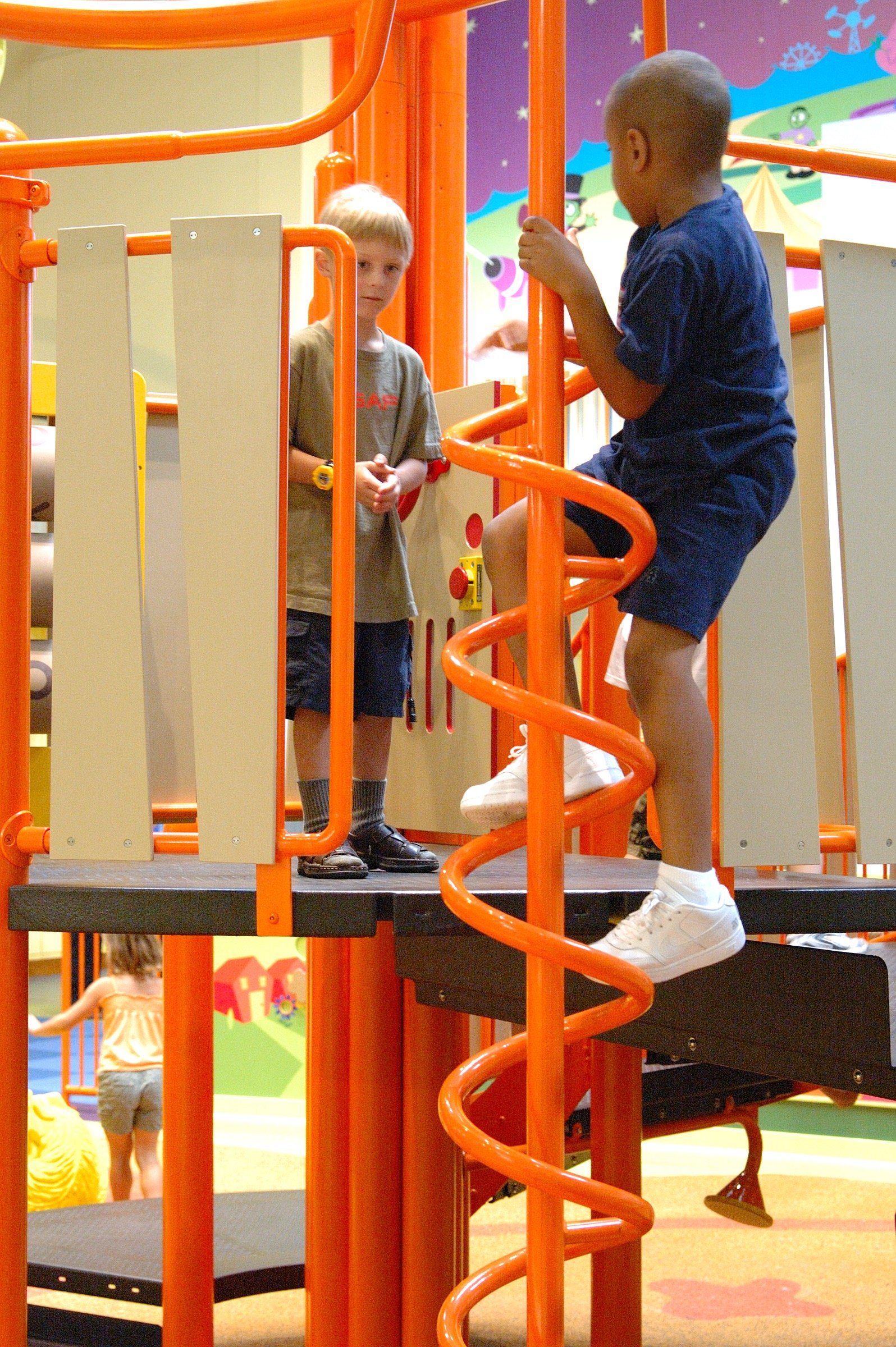 Children playing at PBS Kids Backyard play zone