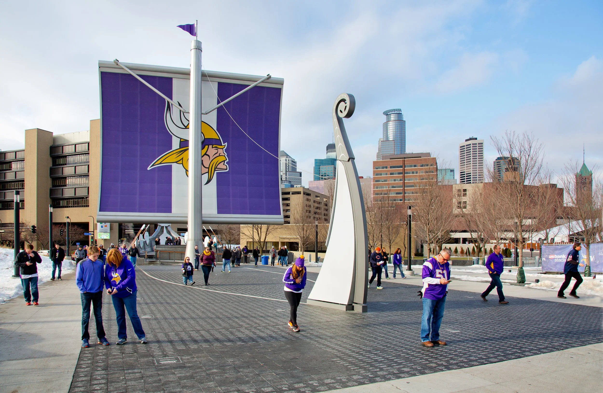 Wide shots of community engagement with the Viking Legacy Ship.