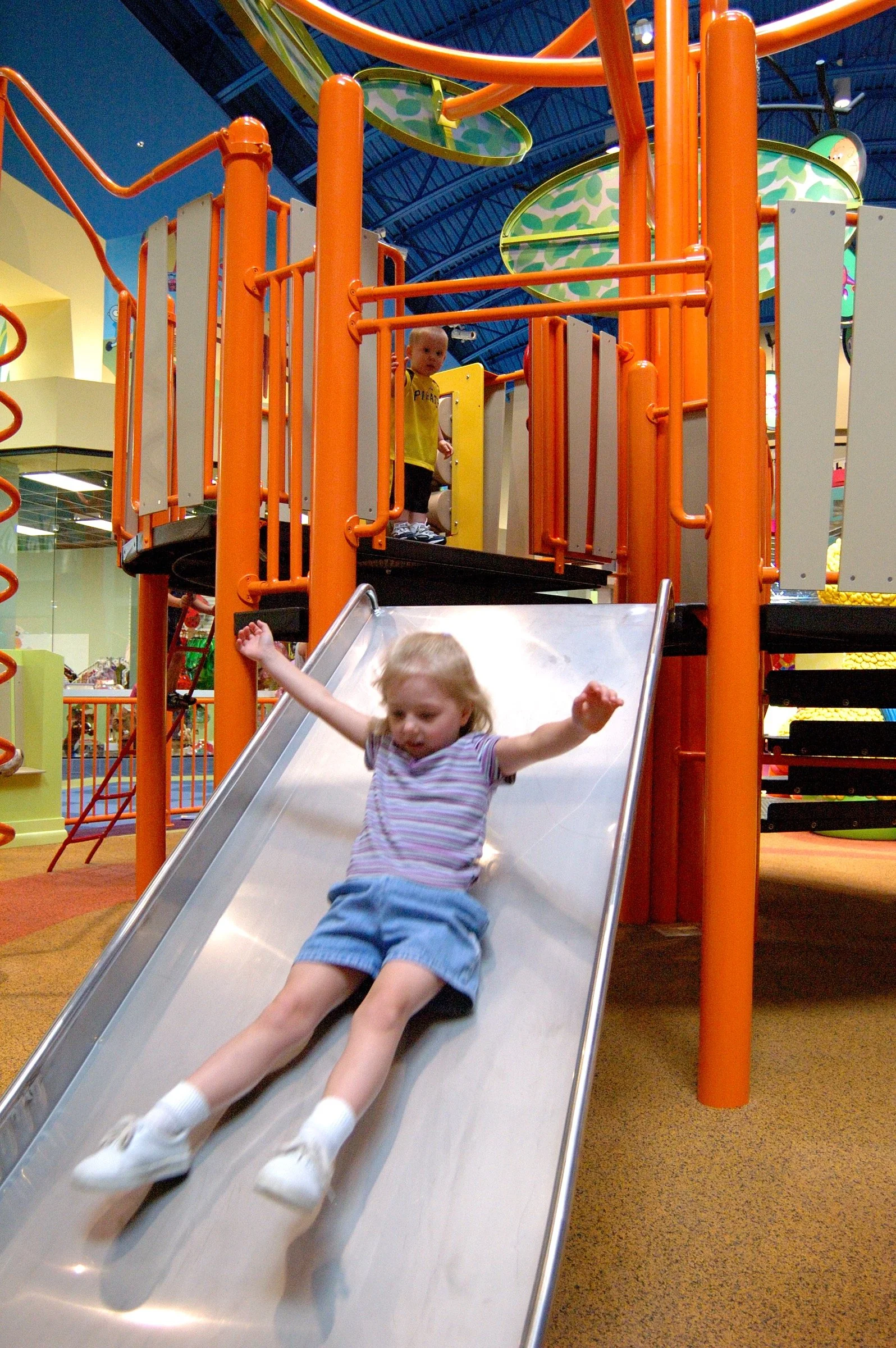 Children playing at PBS Kids Backyard play zone