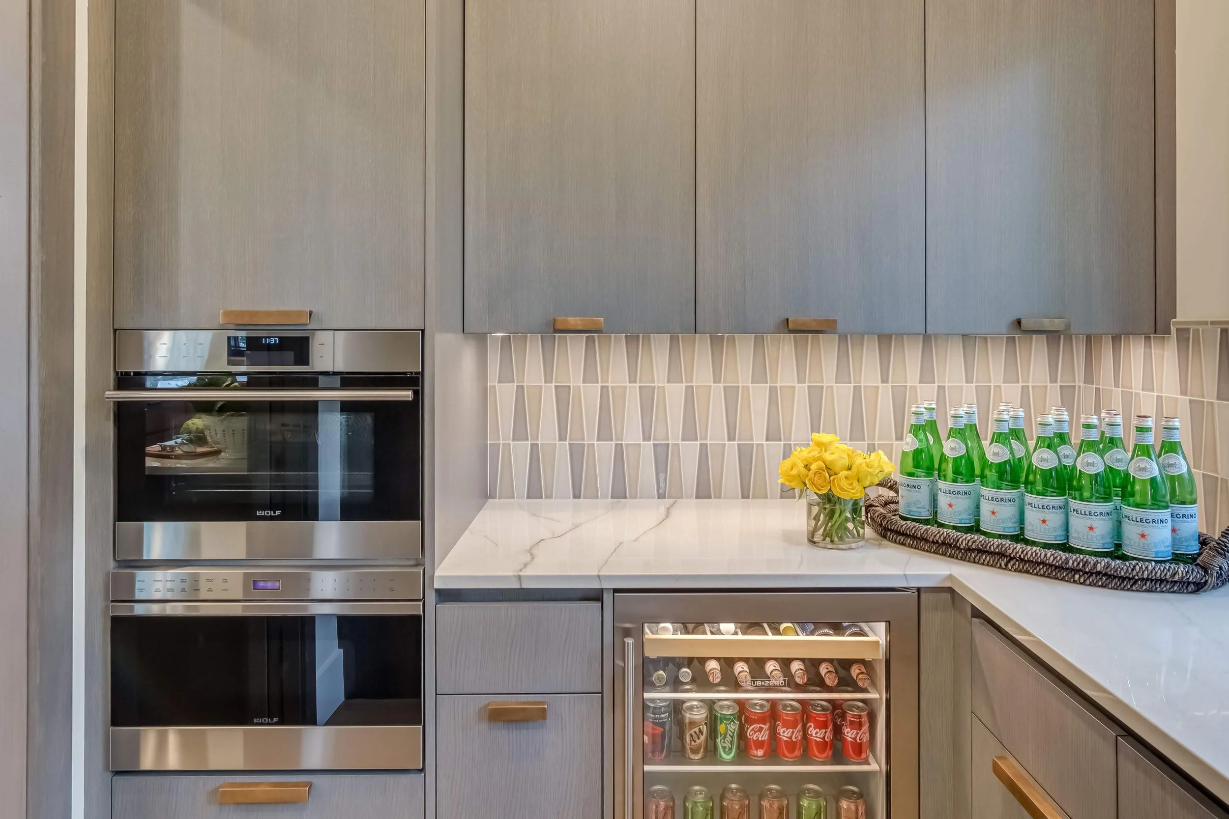 Lake Minnetonka Artisan Home Pantry with luxury tile and countertop, steam oven and microwave