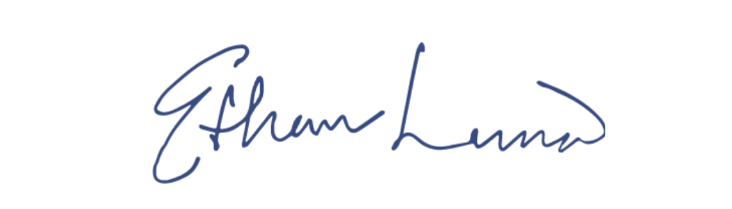 Signature of George H. W. Bush in blue ink.