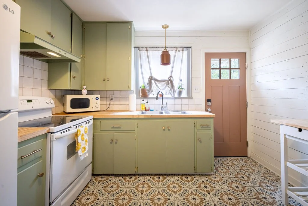 rosedale cottage with beautiful tile in a modern kitchen austin texas