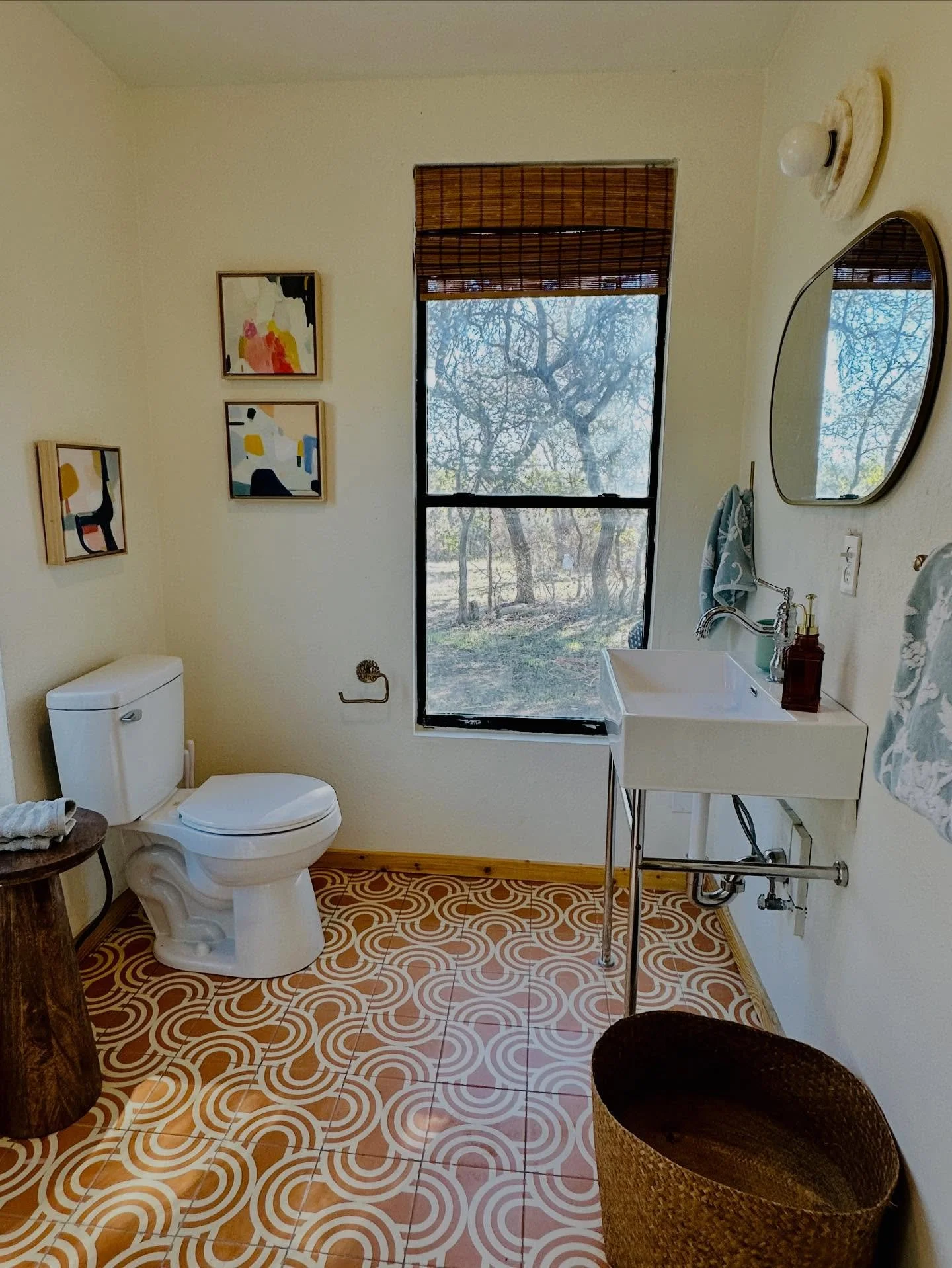 The bathroom steals the show in this hill country cabin! The space was a former print shop we transformed into a modern casita for hill country getaways. Swipe for BEFORE ✨

#airbnb #hillcountry #texas #austin #design 

@cb2 
@clayimports 
@seffiepoo
