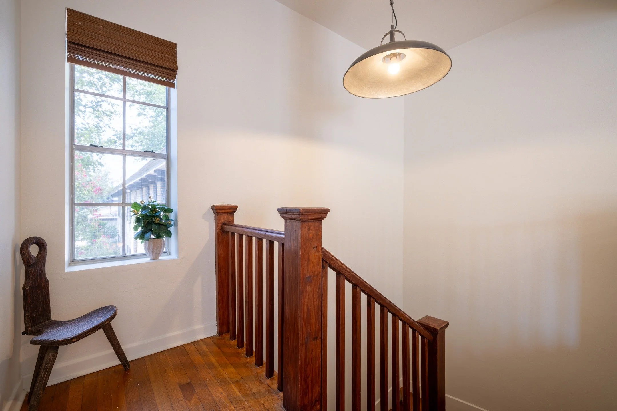 Our team restored these gorgeous posts and handrails to their original glory by stripping the multiple layers of paint, hand sanding, repairing and custom blending the stain. 👏🔥 We're incredibly proud of our team and their dedication to quality fin