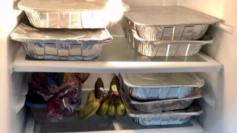 The fridge stocked with delicious Afghan food and other essential items.