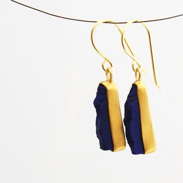 Rough lapis earrings set in 22k yellow gold