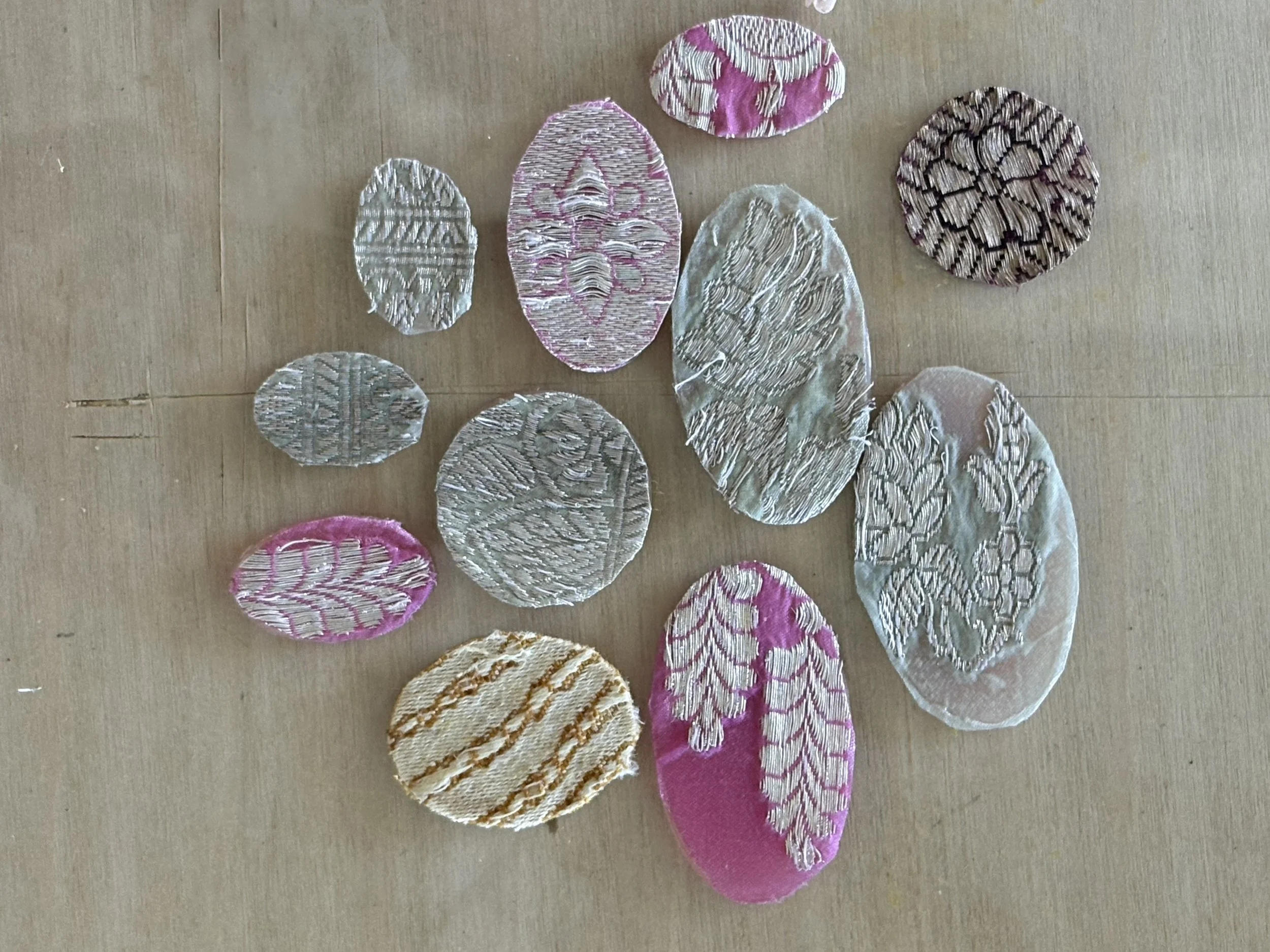 Antique silk cut into shapes is the first step in the lost wax casting process that Maya Kini uses to transfer the patterns and textures of silk to her unique jewelry.