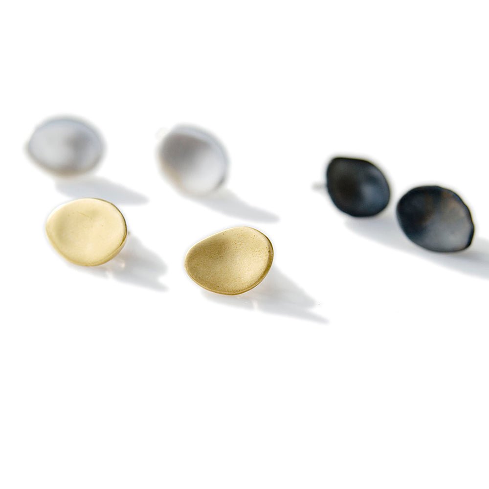 assorted smooth everyday petal 18k yellow gold, silver, and oxidized silver earring studs