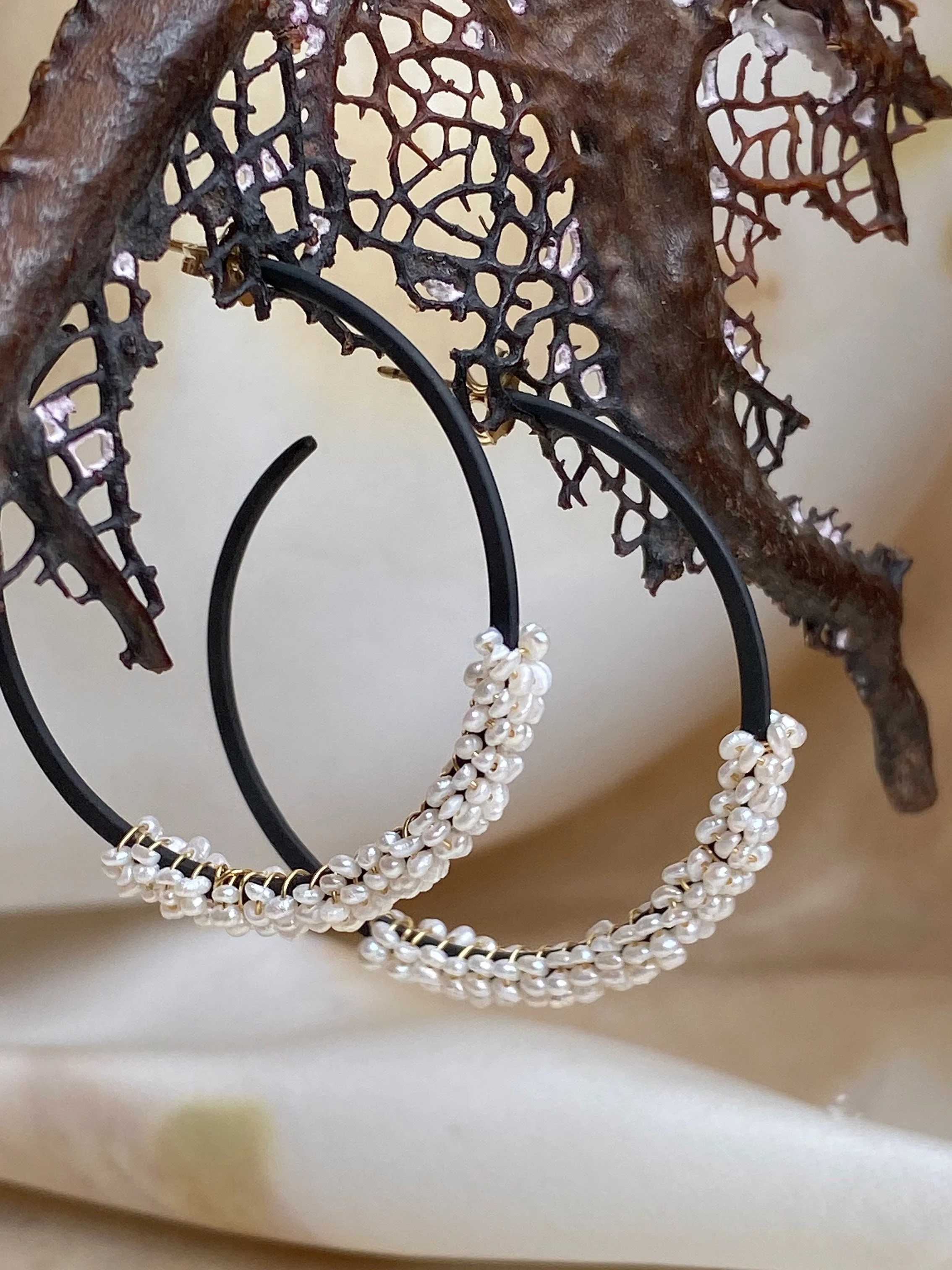 Encrusted hoops, steel + seed pearls