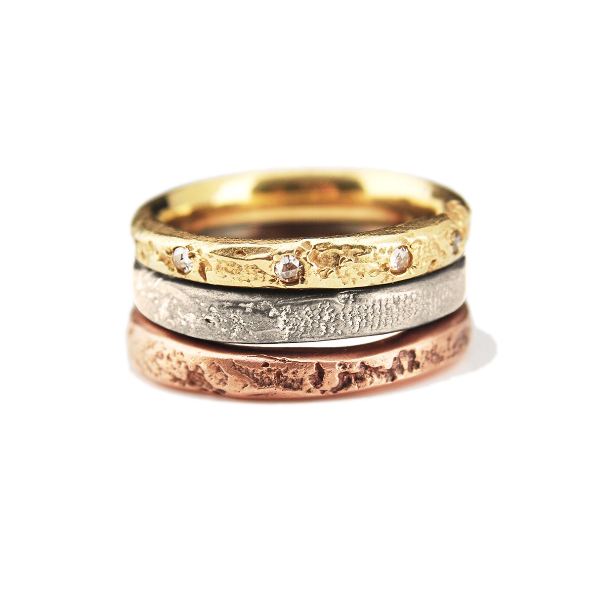 assorted size 6 3mm silk textile textured 18k yellow gold, 14k rose gold, and 14k palladium white gold band rings