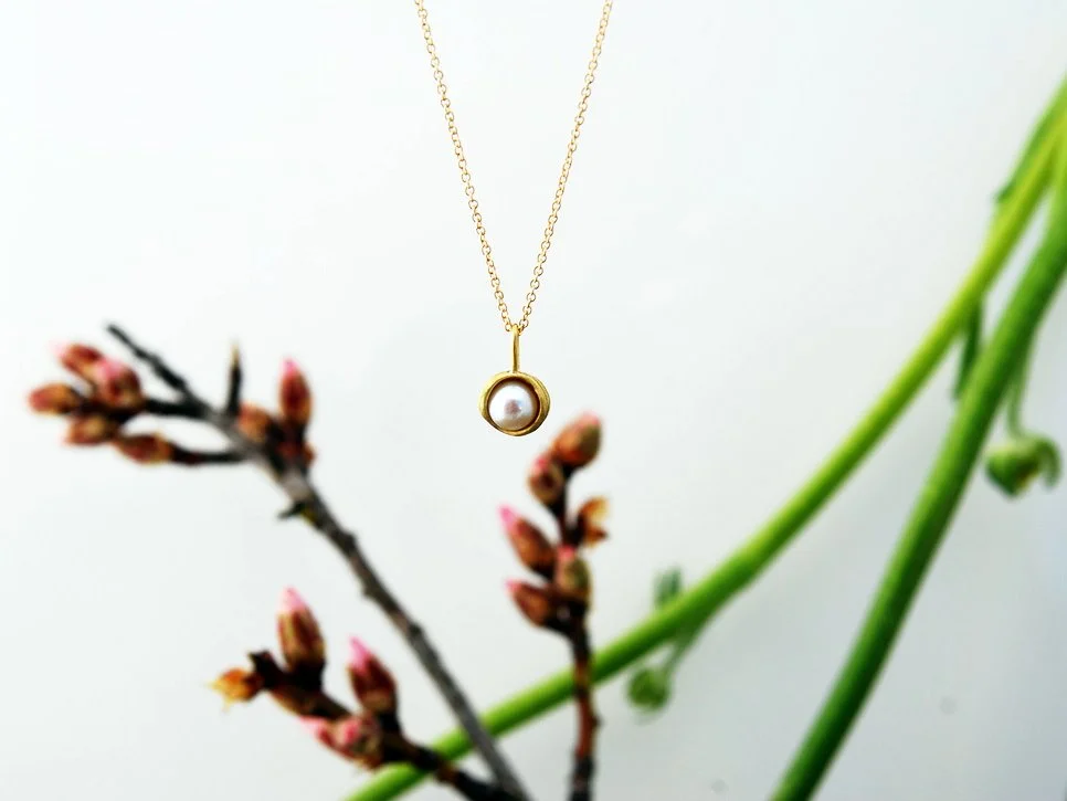 Gold water droplet pearl