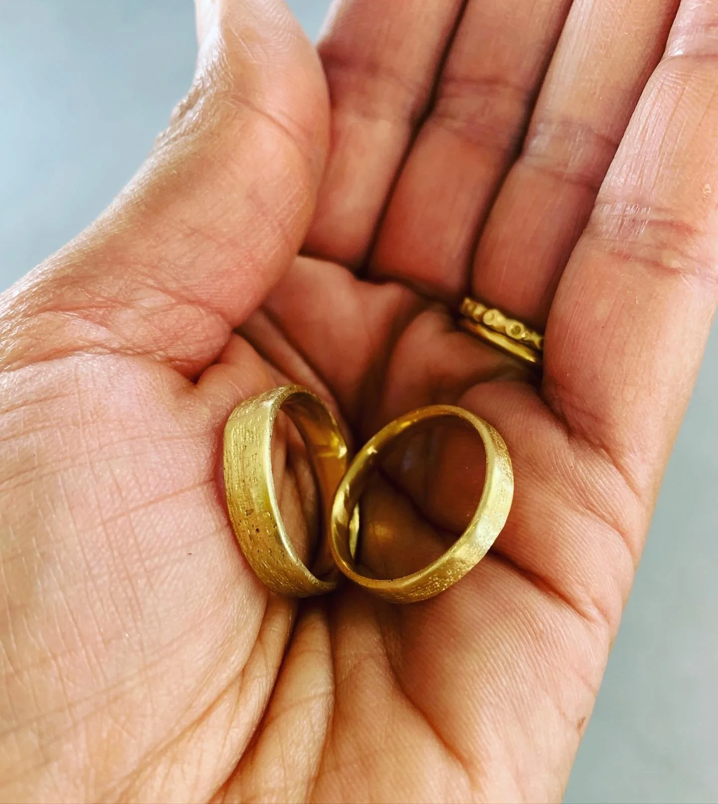 18k silk textured wedding bands