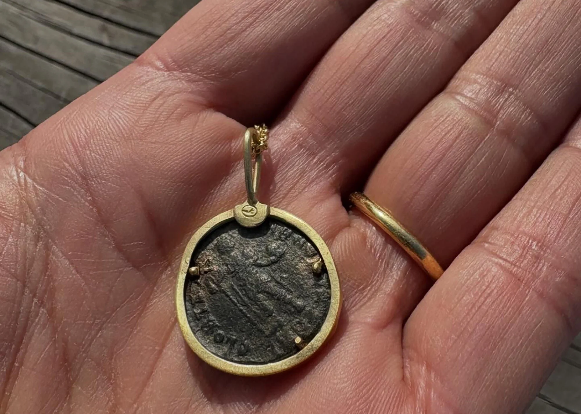 Reverse, ancient bronze coin pendant