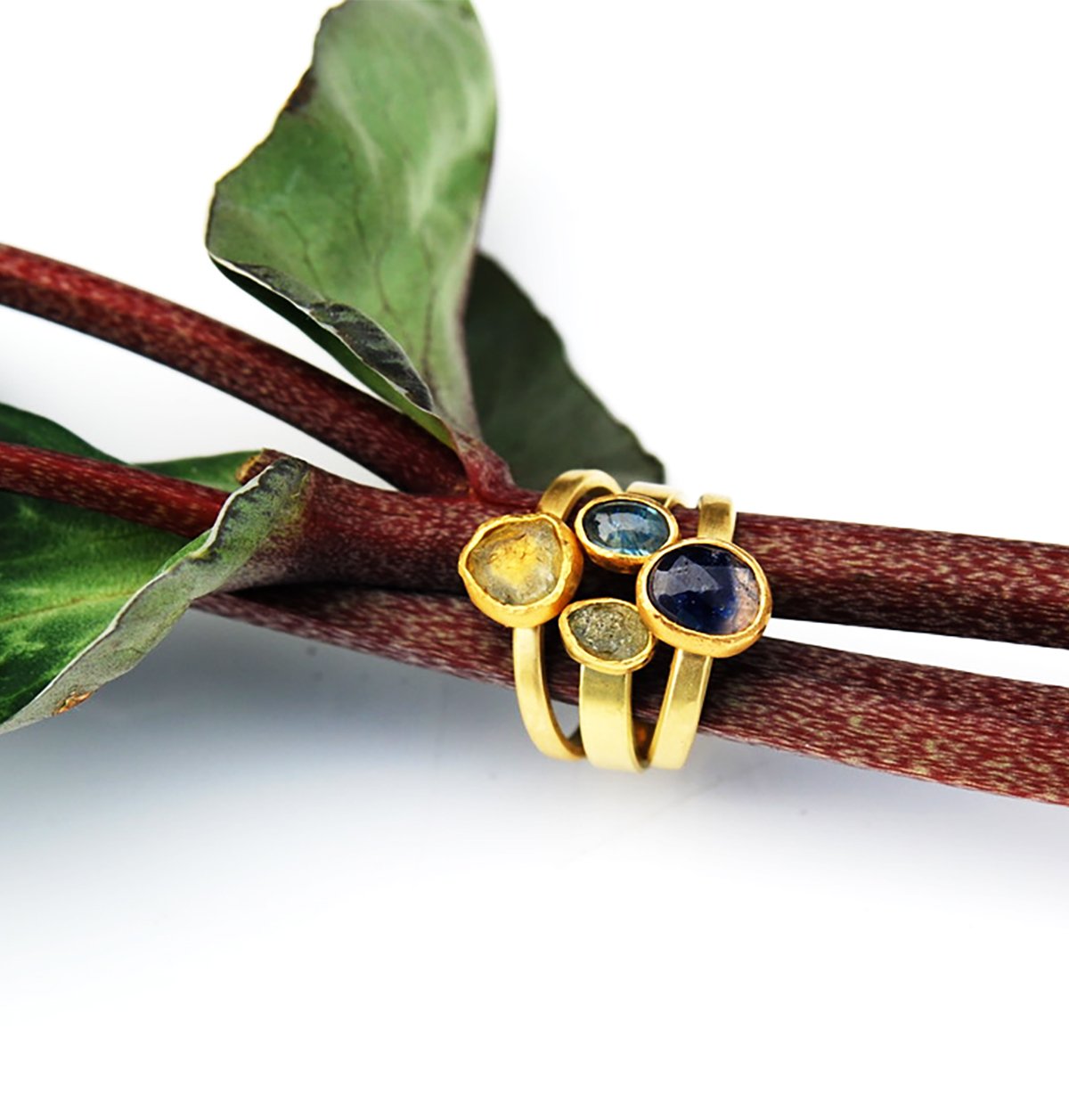 Raw, rosecut and cabachon sapphire stack