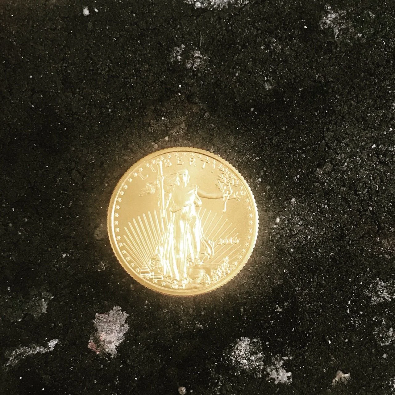 22k yellow gold coin that was rolled and hammered into a statement ring