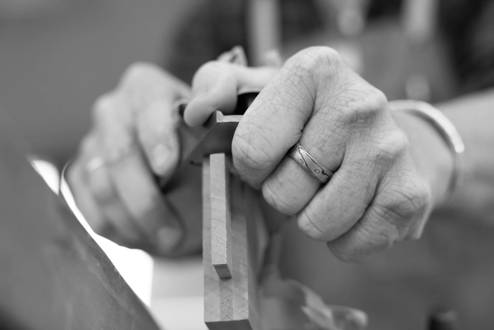 Deirdre with hand plane and ring