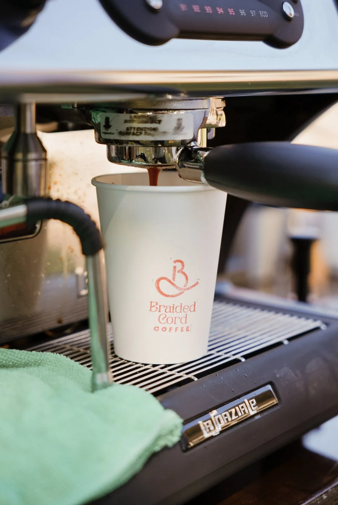Braided Cord Coffee Co. pulling a shot of espresso