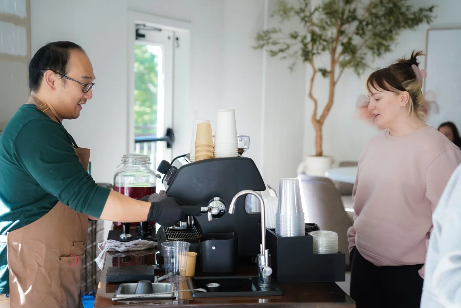 Corporate coffee cart catering with barista serving espresso drinks in Asheville, NC