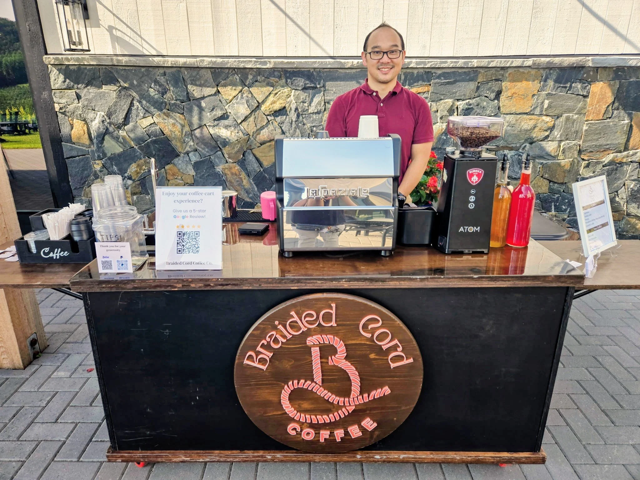 Barista serving handcrafted lattes at an elegant baby shower in Hendersonville